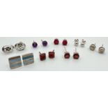 8 pairs of silver and stone set stud style earrings for pierced ears. To include garnet, amber,