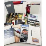 A collection of assorted car brochures together with various motoring and car magazines. To