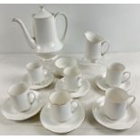 A vintage bone white china coffee set by Royal Standard, with gold rim detail. Comprising: 6