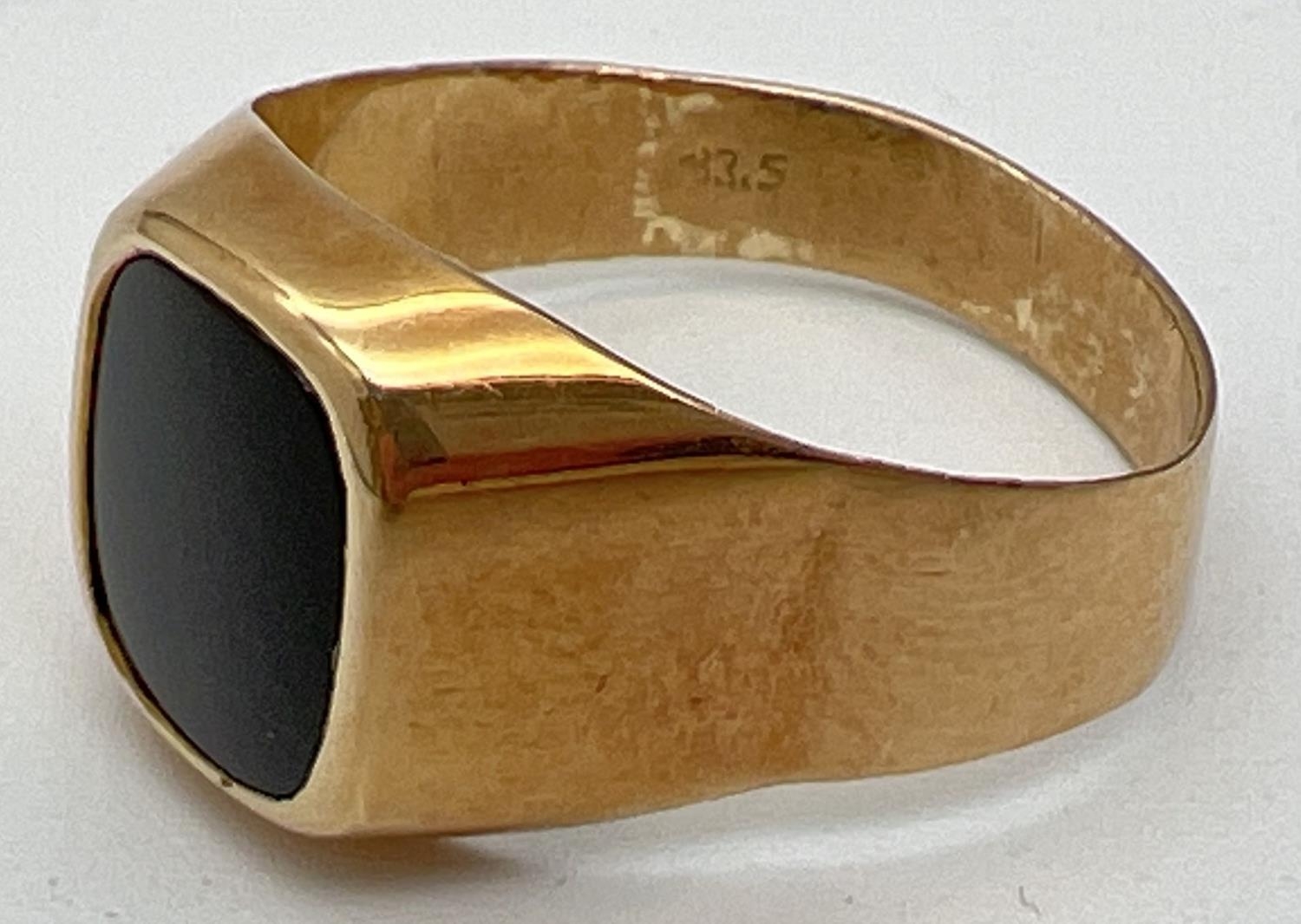 A men's 20ct gold and black onyx signet ring, band slightly misshapen. Stamped 83.5 inside band. - Image 3 of 4