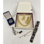 A small collection of costume jewellery and watches. To include a boxed 'Inspirations' necklace,