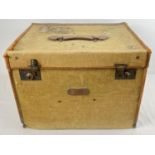 A vintage canvas and leather trim travelling trunk with initials N.L. to top. Leather hadle to top