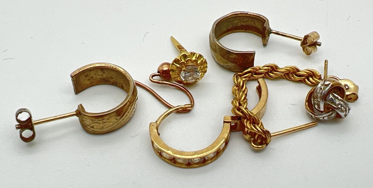 A small quantity of scrap gold earrings, to include stone set. Total weight approx. 4g.