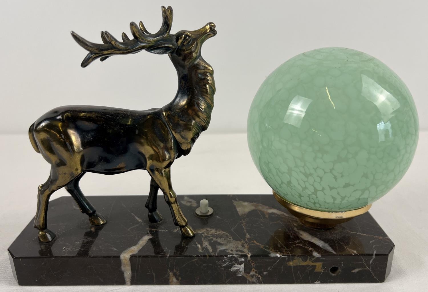 An Art Deco design table lamp with spelter figure of a stag and spherical green glass shade. On a - Image 2 of 2