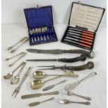 A collection of vintage boxed and unboxed cutlery. To include Horn handled carving set with