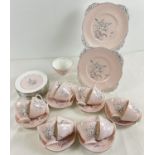 A vintage "Dawn Flight" teaset by Royal Grafton. Pale pink with black and white water fowl