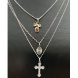 3 vintage silver pendant necklaces. A small cross with engraved detail to front on an 18" fine
