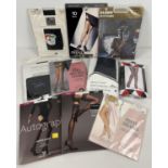 10 assorted pairs of stockings, mostly with patterns or motifs, in original packets.