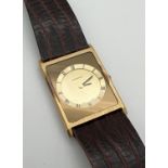 A vintage Catena Swiss quartz square shaped gold tone watch, with original brown leather strap.