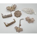 A small collection of vintage silver filigree jewellery items, all with silver number marks to