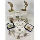 A collection of assorted golfing related collectables to include ceramics, brass figures, pewter