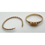 2 scrap gold rings. A thin twist design band (cut through) tests as 9ct gold. Together with