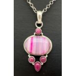 A silver and pink multi stone pendant on a 16" silver belcher chain with spring ring clasp.