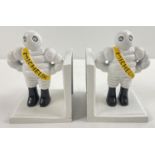 A pair of painted cast metal Michelin man book ends. Each approx. 13cm tall.