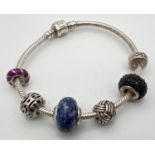 A modern 925 silver 7.5" charm bracelet by Virtue, with 5 silver charm beads. To include