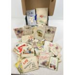 A box containing a large quantity of assorted Edwardian & vintage greetings cards. In varying sizes,