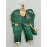 A carved malachite and 14ct gold pendant in the shape of an elephant a/f. With diamond set eye, gold