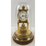 Gustav Becker Medaille D'or 400 day torsion pendulum clock with glass dome. Complete with pendulum