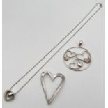 3 items of silver diamond set heart design jewellery. A heart shaped floating pendant set with 3