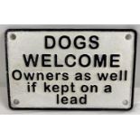 A small cast iron "Dogs Welcome" wall plaque painted black & white. With 4 fixing holes. Approx.