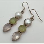 A pair of silver modern design semi precious stone set drop earrings. Each earring set with a pearl,