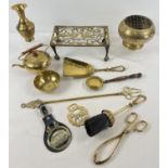 A box of assorted vintage brass items, to include companion set, trivet with pierced bird design and