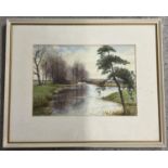 A framed and glazed watercolour of a rural river scene by W. Buxton. Signed to bottom right. Frame