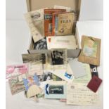 A box of assorted vintage ephemera items to include receipts, postcards, booklets and leaflets.