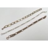 3 decorative silver chain bracelets. A heart link bracelet with spring clasp, a Figaro style