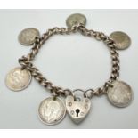 A vintage 8" silver charm bracelet with padlock and silver three pence charms. Coins comprise 5 x