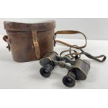 A pair of early 20th century Carl Zeiss Jena D.F.03 military binoculars. Complete with leather