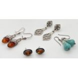 4 pairs of silver drop and stud style earrings. A pair of amber cabochon oval shaped studs, a pair