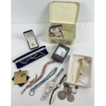 A collection of boxed and unboxed costume jewellery items, goldtone compact with horse detail,