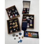 A collection of vintage Girl Guiding brass and enamel badges. Lots includes group leaders ribbon, 10