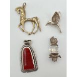 4 vintage and modern pendants. A bronze horse by St. Justin, a modern design silver pendant set with