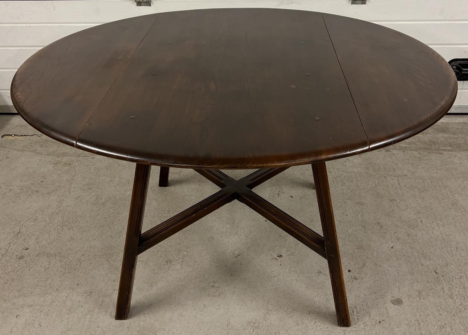 A Mid century Ercol drop leaf dining table together with a set of 4 Ercol dining chairs. Unmarked - Image 6 of 7