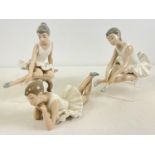 3 Nao Spanish ceramic figurines of ballerinas, all in a seated or laying position. Longest approx.