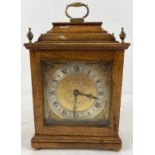 A vintage wooden cased Elliott mantel clock with French escapement. From Croydons Jewellers of