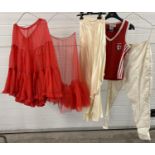 A collection of 5 items of ladies vintage clothing. To include red nylon petticoat by Barbaras