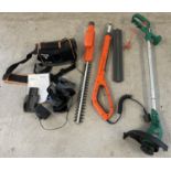 A Flymo Sabre Cut 24V hedge trimmer complete with instructions, power pack, charger, blade cover,