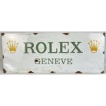 A rectangular shaped enamelled metal wall advertising sign for Rolex. Approx. 23cm x 58cm.