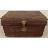 An Edwardian 2 handled tin trunk with original brass catch & lock and studded detail to lid. Brass