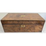 A large Victorian walnut rectangular writing box, hinged cover enclosing an inset tooled and gilt