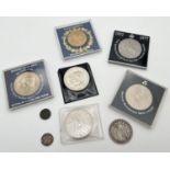 A collection of vintage coins and commemorative crowns. To include 1915 George V half crown and 1918