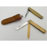 An antique silver blade manicure knife with leather carry purse. Together with a vintage penknife