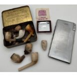 A small collection of vintage smoking related items. A Kincraft cigarette case with integral