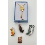A small collection of owl design jewellery. To include a vintage slider necklace, silver brooch