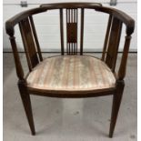 A Victorian dark wood curve backed chair with spindle supports and inlaid detail to panels and back.