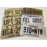A collection of 6 assorted US metal license plates. 4 vintage plates from New Jersey (The Garden
