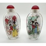 2 Oriental interior painted glass snuff/scent bottles with figural detail to both sides. Each